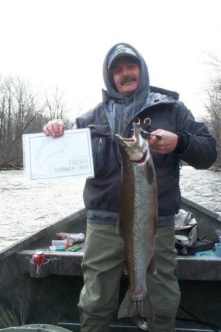 Drift boat steelhead fishing along the Salmon River in Pulaski NY.