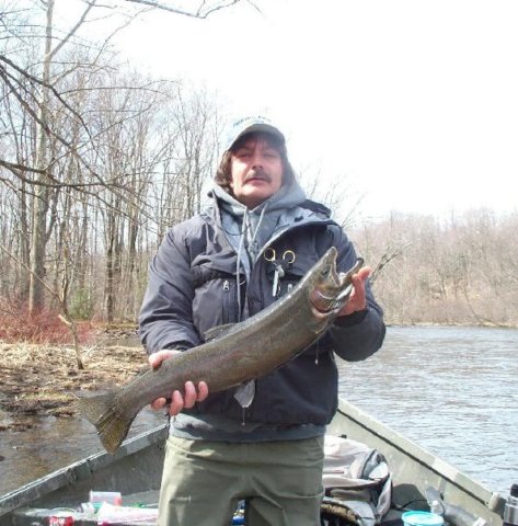 Drift boat steelhead fishing along the Salmon River in Pulaski NY.