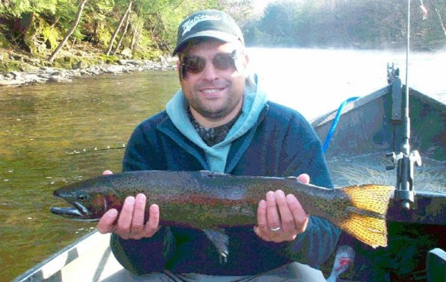 Drift boat fishing for steelhead on the Salmon River in Pulaski NY.