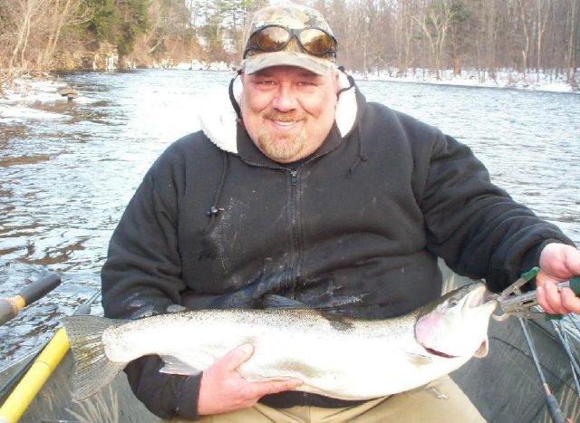 Drift boat fishing for steelhead on the Salmon River in Pulaski NY.