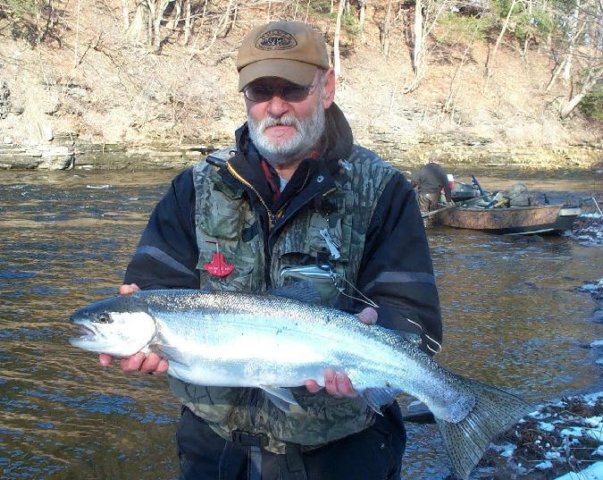 Drift boat fishing for steelhead on the Salmon River in Pulaski NY.