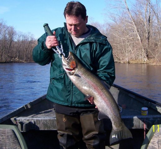 Drift boat fishing for steelhead on the Salmon River in Pulaski NY.