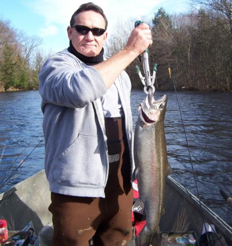 Drift boat fishing for steelhead on the Salmon River in Pulaski NY.