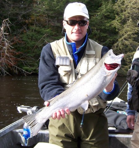 Drift boat fishing for steelhead on the Salmon River in Pulaski NY.