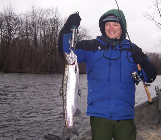 Drift boat fishing for steelhead on the Salmon River in Pulaski NY.